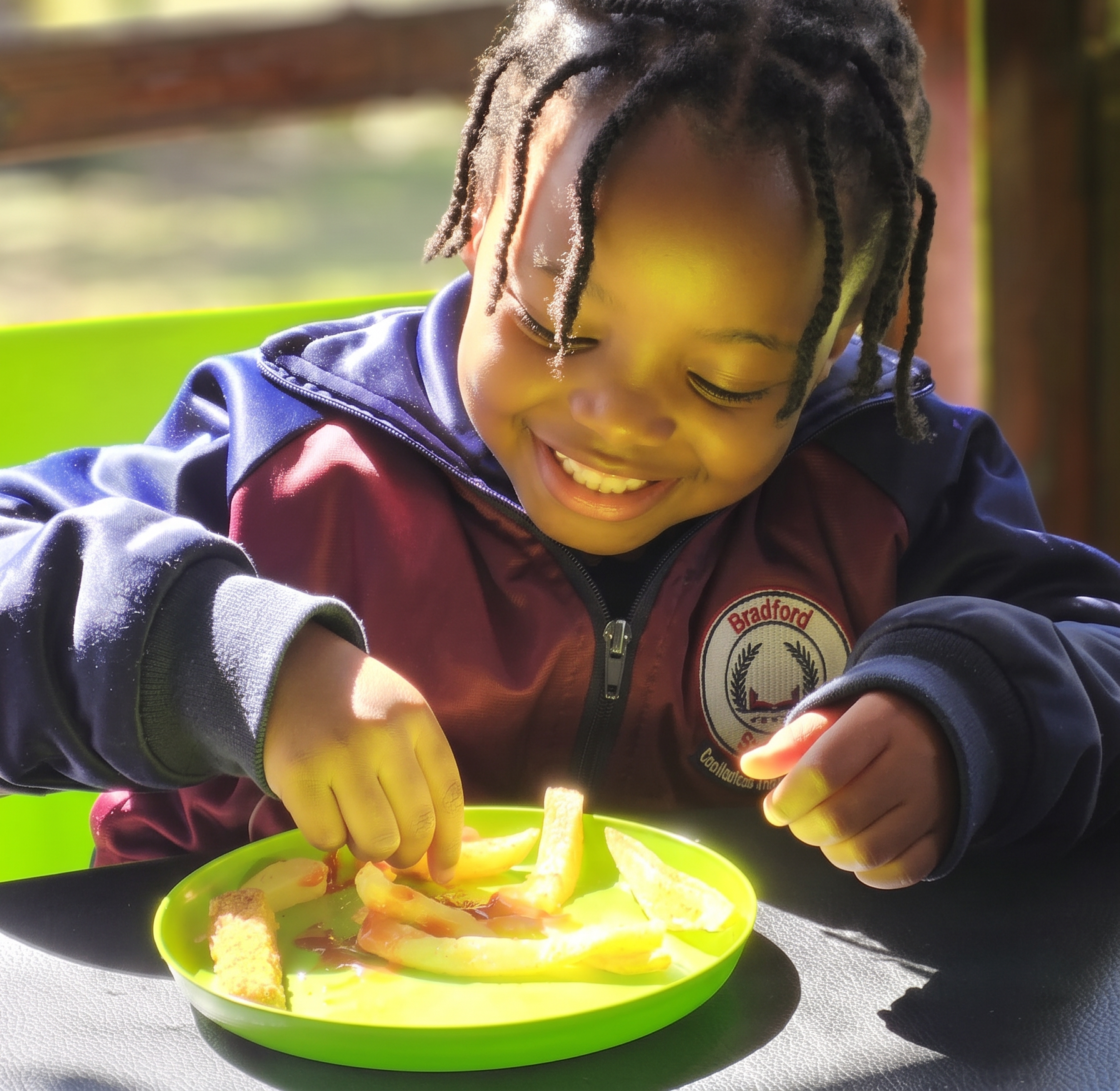 Early Years learners sharing a meal together